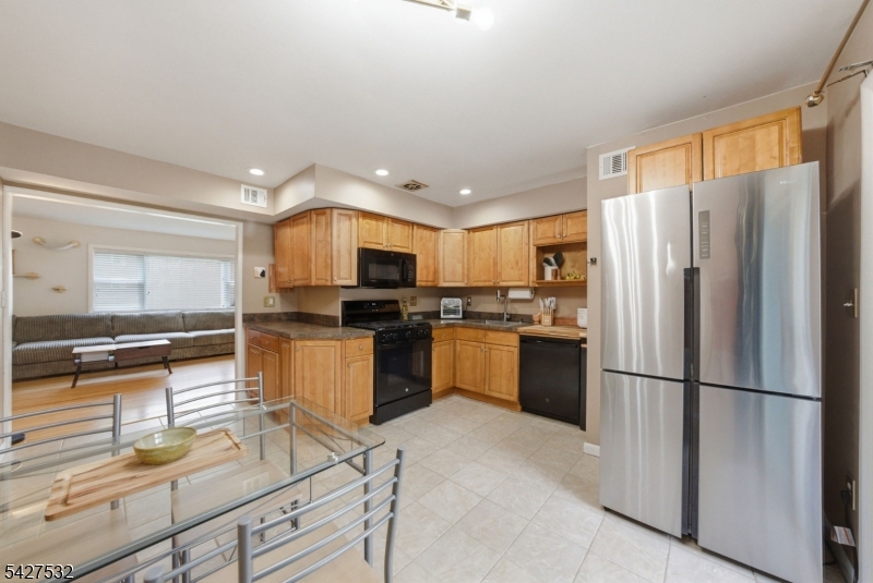 Highly desirable 1st floor home! Enjoy the open feel of this layout that is aglow with natural light. Location! Location! Located off the beaten path in Margate and not facing a parking lot. If you are looking for a serene location within a development, this may be the one! This home's Eat in Kitchen features Maple Cabinetry, newer appliances, a new Stainless Steel Sink & Faucet (Dishwasher & Refrigerator are less than 8 months old)and the Range & Built in Microwave are less than 2 years old. The kitchen also features porcelain tile flooring and sliders to the deck (also not facing a parking lot or main road)! This fine home offers a very spacious LR or it can be used as a LR/DR combo, a tiled Bathroom and a large, freshly painted Primary Bedroom with 2 closets. "Bonus- Living Room features a Walk in Closet." Narrow plank hardwoods throughout this home. So very convenient to Metro Park- Train to NYC with daily parking, GSP exits 131 A or B, the Menlo Park Mall, Target, AMC Dine in Movie Theatre, the beautiful Roosevelt Park and plenty of area eateries! The monthly HOA fee includes- Heat, Taxes, Water, Sewer, and Blanket Insurance. Laundry Facilities are in this building!! Two cats allowed per home. This is CO-OP not a condo. Must Owner occupy for 2 years before renting out!