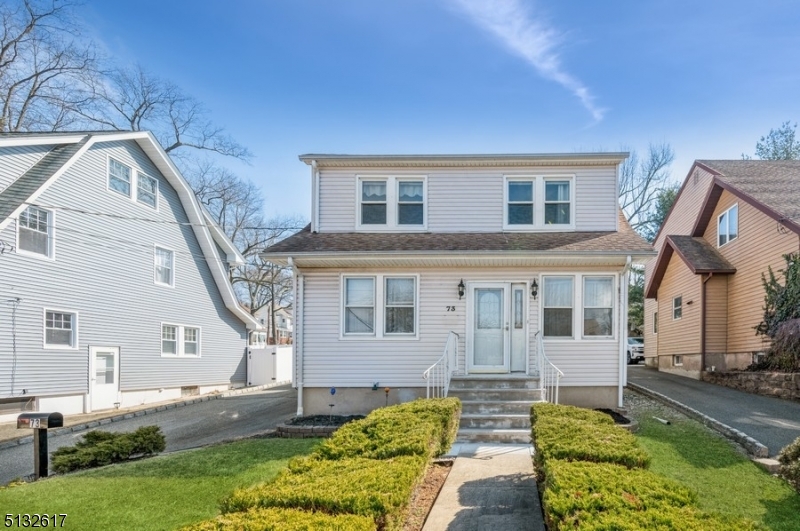 Space, style and comfort in a prime location!Situated on a tree-lined street just twenty miles from Manhattan, this well-maintained Colonial offers four bedrooms, two full bathrooms, a detached two-car garage, and a big back yard. This home is ideally located near popular eateries on Bloomfield Avenue, a lake and trails in Verona Park, cultural activities at Montclair State University, and the bus to Port Authority. For commuters who prefer the train, there are several New Jersey Transit stations in nearby Montclair.A manicured front yard guides you inside to a charming interior with gleaming hardwood floors, recessed lighting downstairs, ceiling fans upstairs and abundant natural light. A cozy sitting room opens to the large, bright living room showcasing a brick surround fireplace. The generous-sized formal dining room is perfect entertaining. The kitchen is updated with granite counters and flows to the breakfast nook with access to the back yard. Enjoy warm weather cookouts on the wood deck overlooking a deep, fenced-in back yard with a storage shed and mature shrubbery screening off your neighbors for relaxing privacy. A bedroom and a full updated tile bathroom complete the main level.Upstairs, the second floor includes the primary bedroom with a walk-in closet, two additional bedrooms and a full bathroom in the hallway. The living space continues in the partially finished basement with a large recreation room, workshop and laundry room.