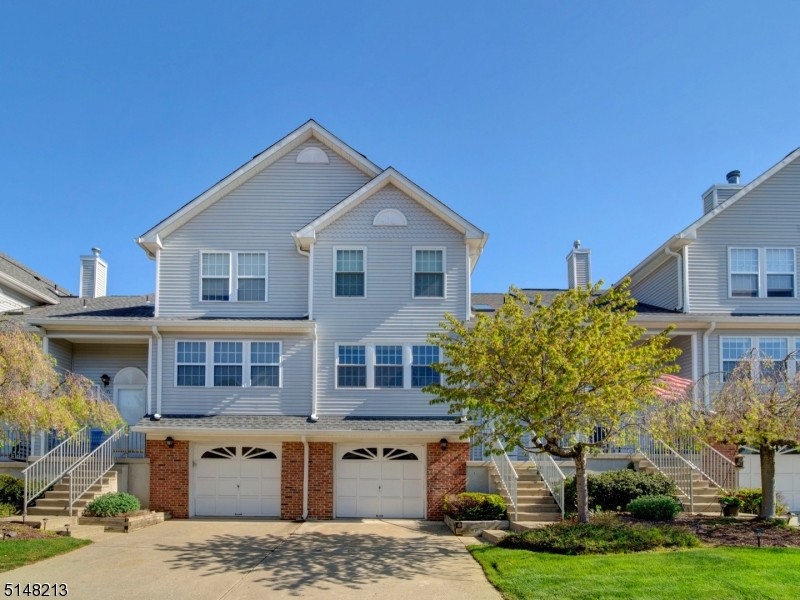 LOVELY 2 BEDROOM, 1.5 BATH TOWN HOME IN DESIRABLE OAK HILL. LARGE, 2 STORY EAT-IN KITCHEN, WITH BREAKFAST BAR, SKYLIGHTS, NEW VINYL PLANK FLOORING & SLIDERS TO BALCONY, LIVING ROOM WITH NEVER USED WOOD-BURNING FIREPLACE, FORMAL DINING ROOM, SPACIOUS MASTER BEDROOM WITH WALK-IN CLOSET.  MAIN BATHROOM FEATURES HUGE SOAKING TUB AND SEPARATE SHOWER STALL.  THE WALKOUT FINISHED BASEMENT IS CURRENTLY USED AS A REC ROOM AND HAS PLENTY OF STORAGE AND LAUNDRY ROOM.  PUBLIC UTILITIES HERE! AMENITIES INCLUDE: TENNIS &  BASKETBALL COURTS, MULTIPLE PLAYGROUNDS, AND A LARGE CLUB HOUSE AVAILABLE TO BE RENTED FOR SPECIAL OCCASIONS! MINUTES AWAY FROM ROUTE 80 AND DOWNTOWN HACKETTSTOWN!