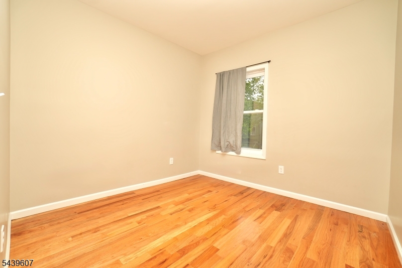 Welcome to this beautifully renovated 3-bedroom, 2-full-bath apartment, featuring a spacious primary bedroom with its own private en-suite bathroom. This bright and modern home offers high ceilings, a fully equipped kitchen with a dishwasher and microwave, and the convenience of an in-unit washer and dryer. All appliances are included for a seamless move-in experience.  Enjoy access to a shared backyard, perfect for relaxing or entertaining. Ideally located near public transportation, local schools, shopping, and dining, this home combines comfort, style, and convenience in one exceptional rental opportunity.
