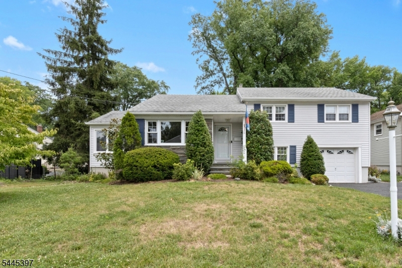 Welcome to this spacious and inviting split level home offering 3 BRs, 2 1/2 Baths and situated on a cul-de-sac. The bright open floor plan includes a kitchen that opens seamlessly to the DR, making everyday living and entertaining a breeze. Just off the LR, a stunning four-season sunroom surrounded by windows fills the space with natural light and offers beautiful views year-round. The grade level family room provides a comfortable gathering space with easy access to the outdoors. Step outside from the sunroom to the deck overlooking the nicely sized backyard. or relax on the paver patio--perfect for outdoor entertaining. Situated on a approx 8800 sq ft lot, this home offers a wonderful combination of comfortable indoor living and outdoor spaces. The unfinished basement with a convenient half bath, is high and dry and offers great potential for added living space. Located just minutes from Cranford's award-winning downtown, featuring the historic Cranford Movie theatre, eclectic and international dining, charming boutiques, specialty shops and inviting coffee houses.  Enjoy nearby parks, the NJ Transit train and bus to NYC and all the conveniences that make Cranford one of Union County's most desirable communities.  Not a flood zone.