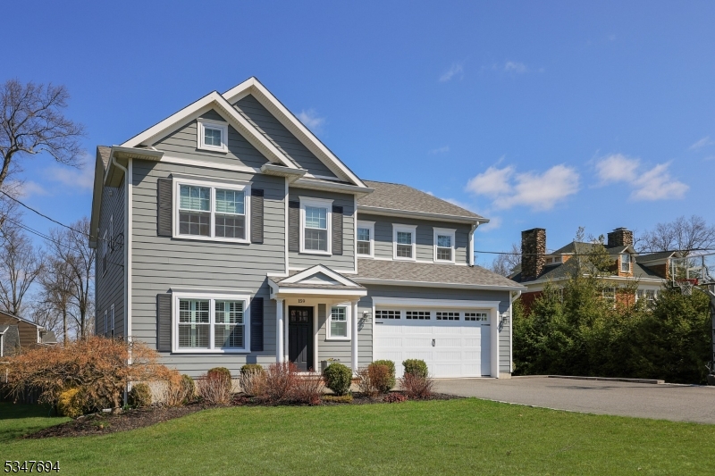 This meticulously maintained residence offers a seamless blend of comfort, luxury, and functionality. As you enter, you're greeted by a private office with double French doors perfect for work or study. The formal dining room features a custom ceiling and dry bar, creating an elegant space for entertaining. The heart of the home is the spectacular kitchen, complete with a center island breakfast bar, quartzite countertops, SS appliances and beautiful marble backsplash. A separate breakfast area adds to the charm and the adjacent sitting area & spacious family room with a gas fireplace offer inviting spaces for both relaxation and gatherings w/ access to a deck. Upstairs, the primary bedroom is a true retreat, featuring dual walk-in closets & luxurious bath with a jetted tub, stall shower, dual vanities & private commode. Two Jack-and-Jill bedrooms share a beautifully appointed bath, while the 4th bedroom boasts its own en-suite bathroom. The second floor also includes a convenient laundry room. The lower level is equally impressive, with a 5th bedroom, convenient full bath, great room, game room, and a dry bar area providing ample space for recreation & entertainment. The professionally landscaped grounds are designed for outdoor enjoyment, with a fenced backyard, Trek deck, paver patio, and 2-car attached garage. Just minutes from downtown Summit's vibrant shopping, dining & NYC transportation options, this impeccably maintained home boasts quality appointments throughout.