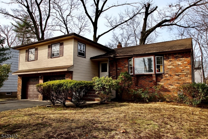 Located in highly sought-after Milnes area, this spacious 3 Bedroom 2 and 1/2 Bath Split Level is ready for a new chapter and so close to schools, NY Trans, Houses of Worship, Bike Path and shopping. 1st Floor offers Entrance Foyer with guest closet, Living Rm w/ vaulted Ceiling and Bay Window, Formal Dining Rm with Sliding Glass Door to Deck, and large Eat-in-Kitchen.  Upstairs you will find 3 generously sized Bedrooms, including Primary Bedroom with its own Bath, along with Main Bath.  Lower Level Family Room has closet, 1/2 Bath, Lg Pic Window,  Fireplace, Entrance to Yard and Ent to 2-car Garage.  Partially Finished Basement is ideal for additional living space plus separate work Rm, separate Storage Rm, and Separate Utility and Laundry Rm.  2 Zone newer C/A and Heating - With solid construction and well-designed layout, this home is ready for your updates and personal touches offering the perfect opportunity to customize and add value. Enjoy all the amenities Fair Lawn has to offer - town pool, dog park, plenty of parks, activities for all ages, Community Center with walking track & gym, , Sports galore - Too many amenities to list - Hurry and make this home yours - Fair Lawn is a great town
