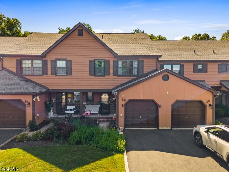 Don't miss this beautifully updated east-facing townhouse in the desirable Manors community of Hillsborough! This move-in-ready home offers 3 spacious bedrooms, 2.5 bathrooms, and a large primary suite with its own private bath. Recent updates include a freshly painted first floor, brand-new 2025 kitchen flooring, a roof replaced in 2019, new siding completed in 2024, a 2023 washer and dryer, and new 2025 range/oven, microwave, and dishwasher. Enjoy relaxing on the beautiful rear deck, then head downstairs to the finished basement featuring a beautiful bar that's sure to become everyone's favorite gathering place. The attached garage adds everyday convenience. Ideally located in the heart of town, you'll be just minutes from shopping, dining, parks, top-rated schools, and major commuter routes. Warm, inviting, and truly move-in ready, this is the kind of home where memories are made from the moment you walk through the door. Opportunities like this in The Manors are few and far between, so don't miss your chance to make this exceptional home your own.