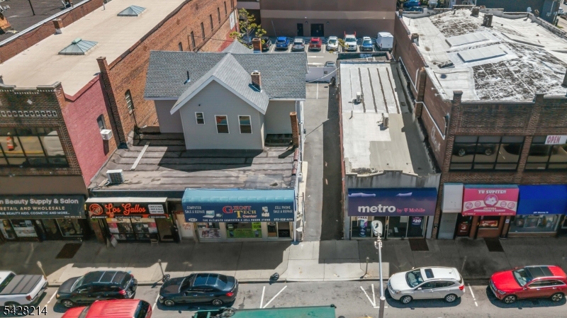 A Prime Mixed-Use Redevelopment Opportunity Positioned along the active Monroe Street corridor, 281-285 Monroe Street presents a rare mixed-use asset with significant redevelopment upside in one of Passaic's steadily evolving urban submarkets. Surrounded by residential buildings, neighborhood retail, and established commercial activity, the property sits within a proven corridor benefiting from ongoing reinvestment and rising investor demand. This is a true value-add redevelopment site, ideal for developers seeking to unlock long-term value through repositioning, increased density, or ground-up redevelopment. The existing mixed-use configuration offers interim income potential, while the underlying value is driven by the site's land position and redevelopment potential supported by local zoning. The immediate area features strong pedestrian traffic, daily convenience retail, and proximity to major transportation routes, offering seamless connectivity to Northern New Jersey employment hubs and direct access to New York City. As Passaic continues targeted revitalization along key corridors, Monroe Street remains a focal point for infill development and urban renewal, reinforcing long-term growth fundamentals and investor confidence. An exceptional opportunity for developers focused on scale, density, and long-term urban value creation.