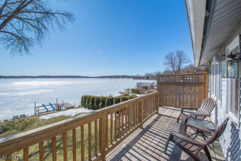 Beautiful LAKEFRONT home, COVETED LOCATION on desirable Culver Lake, centrally located w/ gorgeous year round panoramic views.  Boat, boat lift, paddle boat, row boat, and swim dock all included. This Move-in ready home offers a stunning light filled sunroom, LR w/ beamed ceilings and wood burning fireplace, formal dining room for entertaining, freshly painted kitchen, first floor den/office, 3 nice sized bedrooms, and 2 full baths. Partial basement for extra storage. Entertain by the water on private patio or dine on the new deck. Enjoy all of the amenities Culver Lake has to offer, fishing, motor boating, swimming, and Clubhouse with beach and playground. Start making memories that will last a lifetime. Only 90 mins from NYC. New 3 bedroom septic being installed Spring 2021.