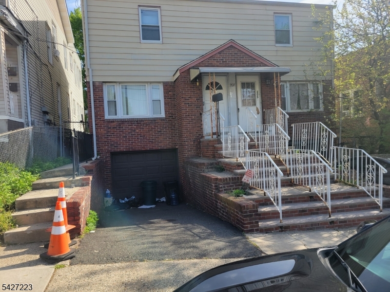 WELCOME TO THIS FANTASTIC SEMI-ATTACHED COLONIAL, HALF DUPLEX. THE LARGE LIVING ROOM FLOWS TO A DINING AREA ADJACENT TO THE UPDATED EAT IN KITCHEN WITH GRANITE TOPS AND MODERN APPLIANCES. THE SECOND FLOOR OFFERS TWO LARGE BEDROOMS AND AN UPDATED MODERN FULL BATHROOM. THE HARDWOOD FLOORS WERE REFINISHED AND ENTIRE HOUSE INTERIOR WAS PAINTED. NEW FLOOR INSTALLED ON ATTIC SPACE, GOOD FOR STORAGE..THE GROUND FLOOR OFFERS A LAUNDRY FACILITY SECTION AND STORAGE SPACE IN THE BACK OF A BUILT IN CAR GARAGE. A FORCED HOT AIR AND CENTRAL AIR UNIT COMPLETE THE DETAILS OF THIS REMARKABLE HOUSE. IN ADDITION THE HOUSE IS EQUIPPED WITH A SOLAR PANEL SYSTEM, WHICH THE SELLER PAYS A LOW AMOUNT OF $60 MONTHLY. SOLAR PANELS CONTRACT WILL BE TRANSFERRED TO NEW BUYER. THIS SYSTEM ALLOWS TO HAVE A VERY COMFORTABLE AND LOW ELECTRIC BILL.TRULY IN MOVE IN CONDITION AND READY TO BE OCCUPIED. THIS SALE IS CONTINGENT ON THE SELLER FINDING A SUITABLE HOUSE. SELLER IS ALREADY ON THE FIELD LOOKING. BOTH CLOSINGS TO COINCIDE AND TERMS OF CONTRACT CAN BE NEGOTIATED SUITABLE FOR BOTH PARTIES.