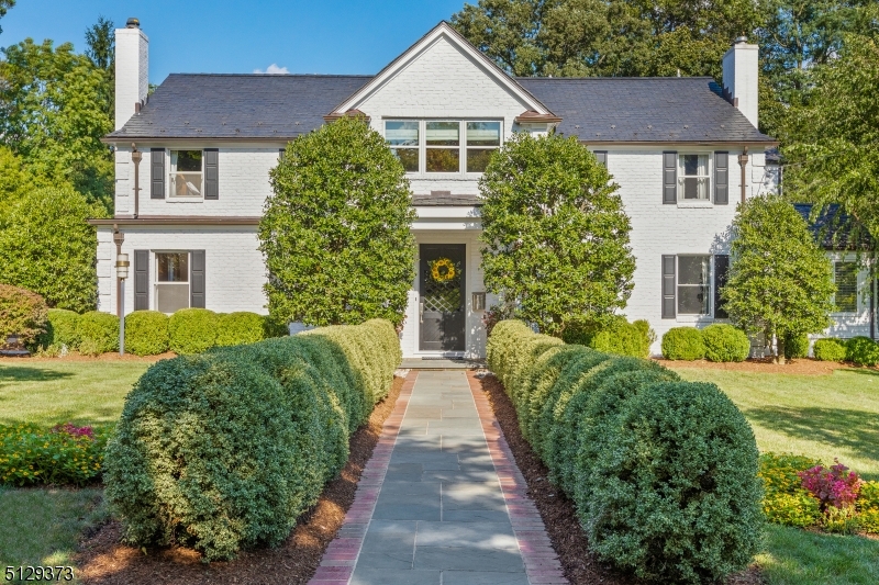Fabulous ultra-chic 7 Bdrm, 5.1 Bath completely renovated brick and cedar CH Colonial (2011) in Old Short Hills featuring fine architectural styling throughout. On highly sought-after Stewart Road, every room features breathtaking details incl. custom wide plank walnut hardwood and black granite flooring throughout.  European inspired details combined with perfect flow for entertaining & everyday living.  Bold staircase with custom ss cable banister.  Neff gourmet EIK with double Sub Zero glass refrig, Viking 6 burner/griddle range, 2 Miele dishwashers & built-in Miele espresso/cappuccino machine.  Intricate floor to ceiling tile work in baths.  Spectacular, sunny breakfast nook & family room overlooking killer backyard with mature specimen trees and gunite pool/spa. Truly magnificent from start to finish.