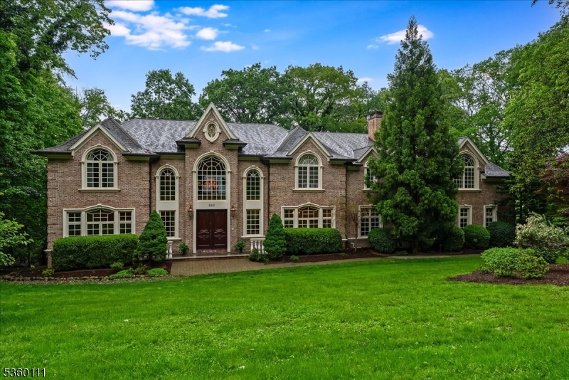 You have to see this one! A truly magnificent Leonard built, 6 bedroom home in Franklin Lakes? coveted South Gate section of Urban Farms. Built in 2006, this all brick Colonial of approx 6700sq ft features 2-stry entry foyer w/bridal staircase, DR w/coffered ceiling & palladian wdw, stunning grt rm with 30ft ceilings w/flr to ceiling wdws, wet bar and fireplace, office w/cherry wd paneling, coffered ceiling & etched glass drs, chef?s EIK w/glazed cabinetry, top of the line SS appliances, adj brkfst atrium w/skylights, first flr bedroom w/ensuite. Second flr with balcony overlooking grt rm, 4 br?s w/ensuite bths, library w/built-in bookshelves & sumptuous primary w/entry foyer, gas f/p, tray ceiling & sitting area, large walk-in closet and spa-like bathroom with soaking tub, 2 vanities & walk-in shower. And there?s more, the walk-out lower level is complete w/movie theatre, billiards area, recreation rm w/kitchenette, gym/bonus rm w/bth, storage rm and access to garage. Outside, the romantic bluestone patio with stone rails overlooks the level yard. Paver driveway and walkways, professional landscaped with sprinkler system and 4 Car Garage! Wonderful location close to town and Indian Trail Club
