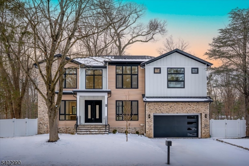 Brand New Construction by NJGCB, a leader in Modern Architecture and Design. HOME UNDER CONSTRUCTION - WORK WITH BUILDER TO SELECT FINISHES.  Contemporary Style meets Luxurious Living in this stunning Custom Smart Home with over 4,600 sq ft of livable space spanning three levels.   An Impressive Home with Grand Foyer, Floor to Ceiling Windows & Modern Glass Staircases.  First Floor w/10ft Ceilings, Formal Living Rm & Formal Dining Rm w/ Butler's Pantry.   2-Story Family Room w/ 18ft Ceilings, Gas FP & Sliders leading to Outdoor Entertaining, including Deck, Covered Paver Patio and Stone Gas FP.   A thoughtfully appointed Gourmet Kitchen w/ High End SS Appliances, Walk-in Pantry, Custom Cabinetry & Large Island w/Quartz Waterfall.  Private First Floor Guest Suite w/ Bedroom & Full Bath.  Mudroom & Powder Room complete first floor.  Second Floor w/9ft Ceilings includes a Luxurious Primary Suite w/tray Ceilings, Private Balcony, Custom WIC's & Spa Bath w/soaking tub, Heated Floors, Dual Vanity & Water Closet. Three Large Guest  En Suite Bedrooms, Separate Home Office & Laundry Room.  Finished Walk-out Basement w/ 9ft ceilings, Bedroom, Bath, Media Room w/ Soundproofing & Speakers, Rec Room w/ Wet Bar & Appointed Gym w/rubber flooring & mirror wall.  Landscaping includes Sod, Irrigation System, 6ft Privacy Fence, BBQ Gas Line. Plenty of room for Future Pool.  May 2026 Completion.  Pictures are from 47 Falcon Road which has similar layout and finishes.