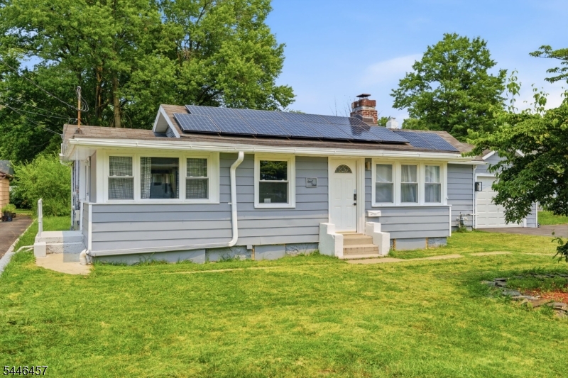 Welcome to this cozy, well-maintained, move-in-ready ranch located in the prime area of upper Lake Hiawatha on a rare double-sized lot. This owner-occupied single-family home, built in 1950, features 3 bright bedrooms and 1 full bath, with abundant natural sunlight throughout the day that creates a warm, uplifting atmosphere. The spacious eat-in kitchen includes stainless-steel appliances and ample storage, while the living room offers a wood-burning fireplace, multiple closets, and generous windows that fill the space with light. Outdoor amenities include a large deck, level yard, stone-built barbecue fireplace, and an almost-new 12x16 storage shed. The property also features a one-car attached garage with a four-car driveway. Energy-efficient upgrades include a fully owned solar system (with transferable SREC credits) and a tankless gas boiler/hot-water heater combo, adding comfort and reducing utility costs. Conveniently located near places of worship and major commuting routes, this home combines comfort, efficiency, and a welcoming environment.