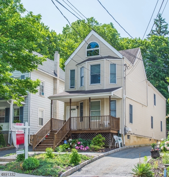 It's all about location, location, location!  This low maintenance townhome is walking distance to everything Morristown has to offer-shopping, dining, mass transit, community theater, commuter routes and more!  Hardwood flooring on first floor, open concept, full basement, 2 generous sized bedrooms and one full one half bath complete the package.  Reserved parking spaces in rear of building.  All new carpeting installed on 2nd floor in 2019. Water filtration system owned and included. Just unpack and enjoy!