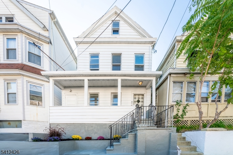 Great opportunity to own this well-maintained two-family home in the heart of Paterson. The first-floor unit offers a comfortable two-bedroom layout, while the second-floor features three bedrooms with updated finishes and bright living areas. Each unit has separate utilities and private entrances, offering flexibility for an owner-occupant or investor. Conveniently located near major highways, NJ Transit, schools, and shopping, this property provides an easy commute to New York City. A private backyard and off-street parking complete this versatile home perfect for generating rental income or living in one unit while renting the other.