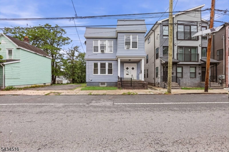 Welcome to 599 S 18th St, a beautifully renovated 2-family home offering spacious layouts, modern updates, and exceptional value in Newark. This impressive property features a total of five bedrooms and three full bathrooms across two well-designed units. The first unit offers three bedrooms and one full bathroom, while the second unit features three bedrooms and two full bathrooms, creating flexible living arrangements with strong multi-family appeal. Both units showcase generous living spaces with separate living rooms, dining rooms, welcoming foyers, eat-in kitchens, and ample storage throughout. A finished basement adds even more functional space for recreation, storage, or everyday use. Outside, the property stands out with a detached two-car garage. Conveniently located near transportation, shopping, and local amenities. Grab it before it's gone!
