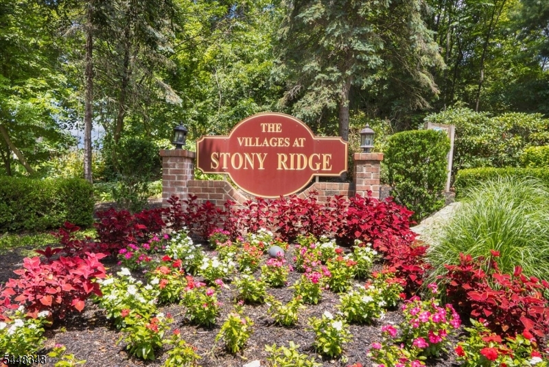 Tucked away in a private park-side setting, this beautifully renovated townhome offers the perfect combination of style, comfort, and convenience in The Villages at Stony Ridge.  Perfectly situated in one of the community's most private locations, this home backs to parkland, offering peaceful, tree-lined views and exceptional privacy.The sun-filled, open-concept main level features hardwood floors and a spacious living and dining area that flows into the stunning, renovated kitchen. Thoughtfully redesigned with gray shaker cabinetry, quartz countertops, stainless steel appliances, subway tile backsplash, recessed lighting, and a breakfast bar, this kitchen is sure to impress.Both bathrooms have been tastefully updated with today's finishes and fixtures. Upstairs, you'll find generously sized bedrooms, including a spacious primary suite, while the finished lower level offers flexible living space perfect for a family room, home office, gym, or playroom.Additional highlights include an attached garage, plenty of storage, and a private setting overlooking wooded parkland.  Enjoy maintenance-free living in one of Haskell's most sought-after communities, conveniently located near shopping, dining, parks, major highways, and public transportation.Move right in and enjoy all that The Villages at Stony Ridge has to offer!