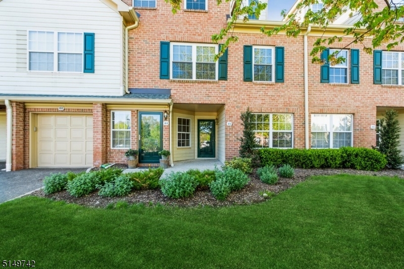 Move-In ready, spacious luxury Townhome with lovely outdoor deck space! This 2 bedroom, 2 bathroom home represents a unique opportunity to own a ranch style model in the desirable Moore Estate community.  Just steps away to the Loantaka Brook Preservation with walking/bike paths through the woods and near the pond.  No steps front entry as well as direct access from garage to the laundry room and kitchen. The main floor features a large and bright dining room and living room with a fireplace and wood floors with convenient sliding glass doors to the covered deck.  Spacious primary bedroom suite with a walk-in closet and private bathroom with jetted tub and stall shower. One additional bedroom, main bathroom, spacious laundry room and kitchen with cozy breakfast area completes the main floor.  The lower level offers a huge fully finished space ideal for guests with two bonus rooms/offices, a family/recreation room and plenty of closets and storage space.   The amenities include clubhouse, exercise room, swimming pool and tennis courts. The association takes care of exterior, snow removal, and landscaping. Enjoy the fitness center, association pool in summer and wonderful community events all year. This home is ideal for a commuter, convenient to both Convent and Morristown train stations as well as to Routes 24 and 287.  It is close to parks, a premier medical center and a lively downtown shopping and dining district.