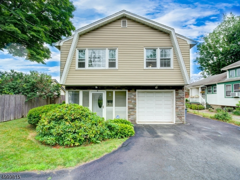 THIS TERRIFIC 4 BR, 2 FULL BATH, RAISED RANCH WAS JUST COMPLETELY REPAINTED AND NEW FLOORING ADDED.  CONVENIENTLY LOCATED IN SOUGHT AFTER SUCCASUNNA SECTION OF ROXBURY. ENTER THROUGH THE GLASS ENCLOSED, 3 SEASON PORCH. THE FIRST FLOOR FEATURES DEN, BEDROOM OR OFFICE, BATHROOM WITH STALL SHOWER, POSSIBLE IN-LAW SUITE, OR COMPLETE FULL HOME OFFICE. ENTRANCE TO ATTACHED GARAGE. SLIDERS WALK OUT TO PATIO AND VERY DEEP BACKYARD.  2ND FLOOR HAS NEWER, EAT-IN KITCHEN WITH STAINLESS STEEL REFRIGERATOR, DINING & LIVING ROOMS, 3 ADDITIONAL BEDROOMS AND BATH.  BRAND NEW HOT WATER TANK, NEWER BATH, NEW FLOORING & ROOF IS ONLY 4 YRS OLD. MINUTES FROM BLUE RIBBON SCHOOLS, SHOPPING & RESTAURANTS, COMMUTER LOCATIONS AND ALL HIGHWAYS.