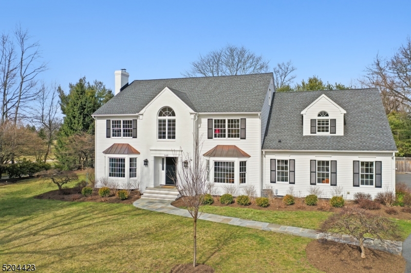 This stunning renovated classic center hall colonial is perfectly set in the sought after Hill section of Madison on .68 private acres just blocks to town, train and schools. This residence is impressive with over 5,600 square feet of living space.  This home offers everything home buyers want today including architectural interest, an open floor plan, spectacular renovated chef's white eat in kitchen with Wolf, sub zeros and Viking appliances, 3 finished floors of living space and 5 bedrooms and 4.1 baths.  A special feature of this home is there are three rooms on the first floor just for relaxing, which includes the family room with cathedral ceilings off the kitchen, the den and living room, they all boast large windows offering plenty of sunshine and gas fireplaces.  A first floor bedroom, mudroom, full bath, half bath, banquet sized dining room, wet bar with wine fridge, and spacious foyer complete this amazing first level.  Continue to the second level and you enjoy 4 generous bedrooms, a large primary with office featuring a cathedral ceiling, 2 walk-in closets, new spa like bath with tub and shower and radiant heat and a laundry room.  The third level is a bonus space, perfect for office, play room or studio.  Additional special features are a 3 car garage with stairs to the basement, back stairs, private yard with blue stone patio and shed, numerous updates and an unfinished basement waiting for your special touch. Enjoy all Madison has to offer in this great home!