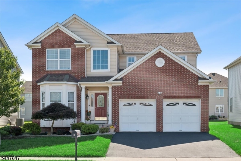 Don't miss this impeccably maintained, Newer Center Hall Colonial, custom built in 2012 for the current owner and located in a desirable, quiet neighborhood. Thoughtfully designed w/numerous upgrades throughout, this move-in-ready home features a full brick front & a grand two-story entry foyer. The spacious eat-in kitchen offers granite countertops, 42" upper cabinets w/glass doors, Gas Stove w/Exterior Vent, ceramic tile backsplash, crown moldings, & stainless steel appliances, all flowing seamlessly into the inviting Family Rm w/an upgraded gas fireplace that turns on with the flick of a switch. Formal Living Rm & Dining Rm, along w/beautiful upgraded hardwood floors throughout the first level, add warmth & elegance. The upgraded Powder Rm features a marble vanity. Upstairs, you'll find 3 generously sized Bedrooms, including a spacious primary suite w/2 walk-in closets & a large en-suite Bath featuring an oversized shower. The extra-high Full Basement was upgraded during construction w/an additional course of block & professionally finished in 2021 w/permits, providing exceptional additional living space + Large Storage Area. Step outside to enjoy the lovely paver patio, professional landscaping, & lawn sprinkler system that keeps the property looking its best. The attached 2-car garage features a durable epoxy floor. This exceptional home truly has it all-3 Min to Shoprite & Tons of Shopping quality construction, thoughtful upgrades, & meticulous maintenance throughout.