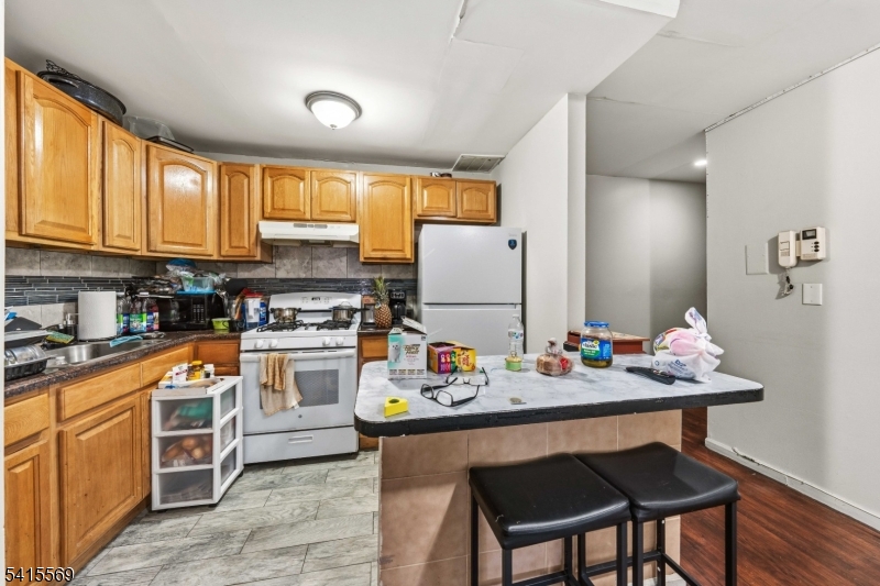 This 1-bed, 1-bath with an additional room perfect for your "work-from-home" office or a media den it is offered at a great price. Perfect for first time buyer or investor. The condo is situated in an unbeatable location, you're just steps from schools, shopping, dining, and the train station. A commuter's dream!Move in with confidence: Seller will pre-pay your first 12 months of HOA fees via a closing credit. Enjoy a full year of maintenance-free living without the monthly overhead, allowing you to settle in and save while your home value grows
