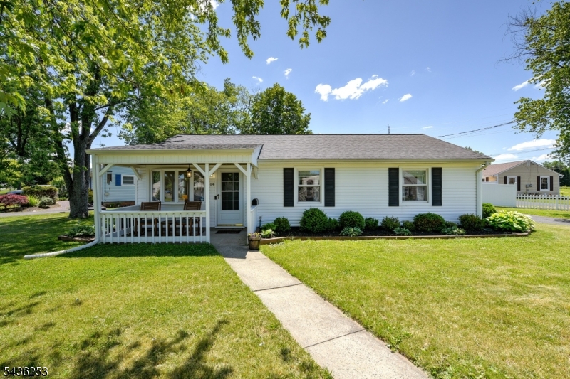 This inviting and endearing 3BR Ranch has been artfully designed and renovated throughout!  The gorgeous Kitchen will delight your culinary senses with its large island, quartz counters, dimensional subway tile backsplash and stainless steel appliances.  The bright, white and airy Kitchen is open to the dining area and living room, and the home has been painted in neutral shades that induce relaxation.  Luxury vinyl plank flooring grace every square foot of the home, and the home's many windows usher in great natural light.  The bathroom is pleasingly renovated, and there is a separate laundry room, featuring abundant cabinets.  Your new home will have a lot that is NEW about it.  New roof, gutters, and downspouts on both house and garage. The sliders to the large and lovely, and recently resealed, patio are likewise new.  The A/C was installed in 2026, and the HVAC is newer.  The home's interior doors have been replaced and the moldings have been updated. The over-sized 2-car garage has welcome loft storage.  The home's outdoor areas are a sheer pleasure.  The front covered porch provides peaceful enjoyment, and adds great charm to the home, while the fenced-in backyard, with its expansive patio and lush lawn and shrubs, is the ideal spot in which to entertain, or spend quality time with books or your thoughts! The home sits on the border of Somerville; enjoy its downtown, filled w many eateries and shops. Near Rts 22, 287, 202/206, Acclaimed for quality Bridgewater schools.