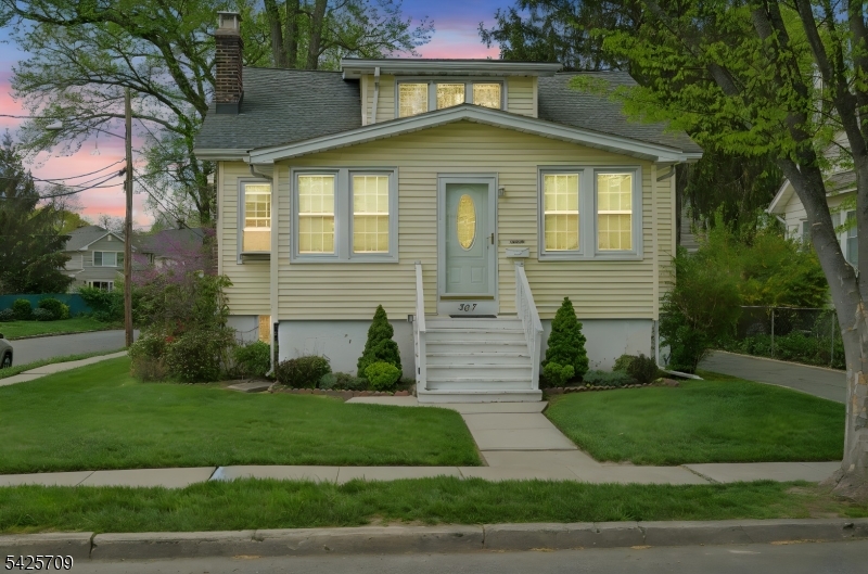Charming Cape Cod located in one of Cranford's most desirable neighborhoods on the North-side. This 3 bedroom, 2 full bath home offers a warm and inviting layout, featuring a cozy family room, a living room with wood burning fireplace, a formal dining room, an eat-in kitchen, and a one-car detached garage. The first floor includes two bedrooms, a full bathroom, and a conveniently located laundry room, while the second level offers a  spacious primary bedroom suite with a full bathroom and walk-in closet. A full basement provides ample storage space. A rear patio and private yard creates the perfect setting for outdoor relaxation or entertaining. With solid bones and endless potential, this home presents a wonderful opportunity to customize and make it your own. Ideally located near bike and walking paths, Nomahegan Park, Cranford Canoe Club, Cranford Municipal Pool, top-rated schools, NYC transportation, and Cranford's award winning vibrant downtown. Don't miss the chance to create your forever home in one of Cranford's most sought-after neighborhoods! Not located in a flood zone.