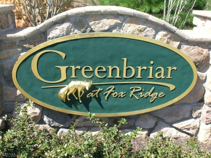 Beautifully maintained open-concept condo in one of the most desirable Active 55+ Adult Communities in Morris County!  Featuring 2 bedrooms & 2.5 baths. The oversized primary suite offers two walk-in closets and a spa-inspired bath with dual granite-topped vanities. A generously sized second bedroom includes its own en-suite bath with new glass shower doors and walk-in closet, ideal for guests or a private retreat. The kitchen is thoughtfully appointed with granite countertops, stainless steel appliances, and a breakfast bar that opens seamlessly to the living area. A sun-filled den/flex room off the living room provides optional space, perfect for a home office or sitting area. Additional conveniences include an in-unit, side-by-side washer and dryer (newer washer), underground covered garage parking, and a dedicated 10' x 10' storage space. Residents enjoy a resort-style lifestyle with access to a large clubhouse offering in & outdoor pools, fitness center, art studio, billiards ,card rooms, dance and aerobics studio, picnic pavilion, tennis courts and so much more including a lively calendar full of activities. Ideally located under an hour from NYC and just minutes to shopping, dining and public transportation.  MAINTENANCE FREE LIVING AT ITS BEST!  Being sold as is with no known deficiencies. Can close quickly!