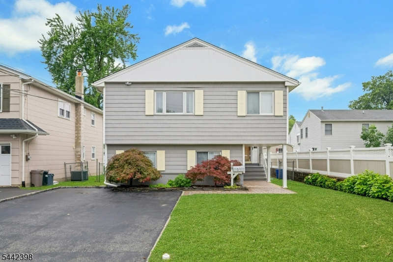 Welcome to this beautifully maintained, move-in-ready home located in one of Parsippany's most desirable neighborhoods. Offering four spacious bedrooms, two full bathrooms, and a cozy den that can easily be converted into a home office, this home combines comfort, functionality, and modern upgrades. The sun-filled main level features a welcoming living room and gleaming hardwood floors throughout, creating a warm and inviting space for both everyday living and entertaining. The spacious eat-in kitchen has been thoughtfully updated with new quartz countertops, a stylish backsplash, and a new stainless steel refrigerator. An additional refrigerator on the first floor provides extra convenience, while abundant cabinetry offers plenty of storage. A water filtration system is installed at the kitchen sink. Throughout the home, you'll find generous closet space and ample storage. Additional upgrades include a Scale Blaster water conditioner in the utility room to help reduce water hardness, a water heater replaced in October 2021, and a new furnace and central air conditioning system installed in October 2023. The home is also equipped with a Tesla charging station. Beautifully maintained backyard, perfect for entertaining & gardening. Two large storage sheds provide excellent space for seasonal equipment, tools, and outdoor essentials. Close Proximity to restaurants, shopping and close to all major highways.