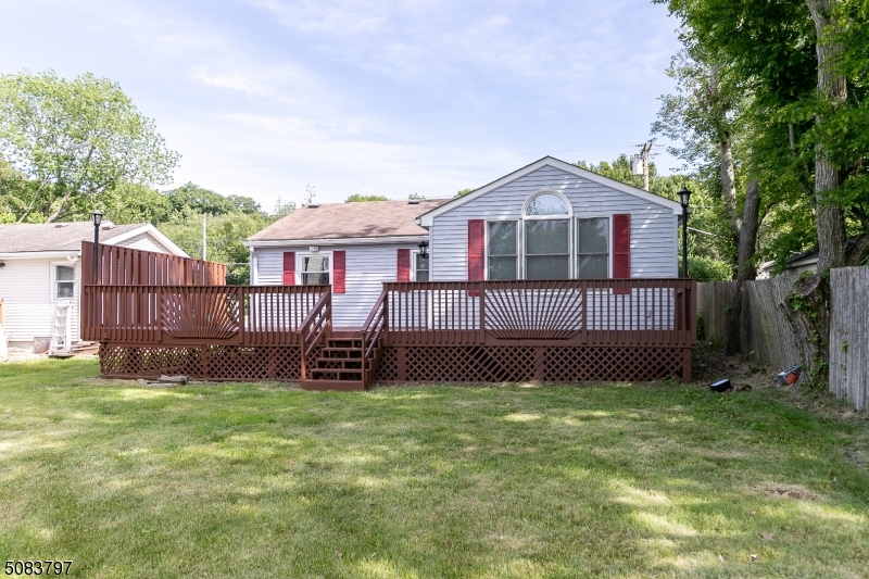 CASH OR RENOVATION LOAN BUYERS AND INVESTORS WELCOME!  BEING SOLD STRICKLY AS IS!!  SUPERB LOCATION IN JEFFERSON TWP LAKE HOPATCONG. RECENTLY UPDATED KITCHEN, FLOORS, AND PAINTED. LARGE DECK OVERLOOKING FLAT LEVEL YARD AND LAKE. EASY ACCESS TO WATER- SWIMMING, BOATING ETC. LARGE GARAGE, DONT MISS THIS GREAT OPPORTUNITY. VAULTED CEILING & SKYLIGHT, INCLUDES  LAKE ACESS PRIVILIGES.
