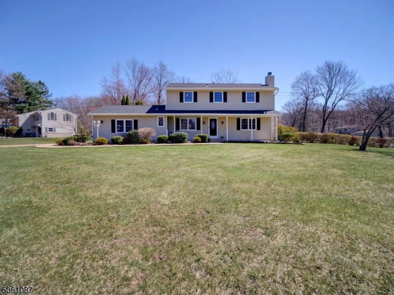 WELCOME HOME TO THIS 4 BEDROOM, 2.1 MOVE-IN READY COLONIAL ON A HUGE CORNER LOT.  LARGE KITCHEN WITH SEPARATE DINING AREA FEATURES VIKING APPLIANCES AND CORIAN COUNTERTOPS. WOOD FLOORS, RECESSED LIGHTING, CROWN MOLDING, FINISHED BASEMENT & MORE! ENJOY THE HEATED IN-GROUND POOL (LINER IS 5 YRS OLD)AND COVERED PORCH W/SURROUND SOUND SPEAKERS. LOVELY LANDSCAPING ON ALMOST AN ACRE. GREAT HOME FOR ENTERTAINING INSIDE OR OUT; NEWER BATHS/GARAGE DOORS/SHUTTERS/FRONT DOOR; KITCHEN OPENS TO FAMILY ROOM/DEN; FIREPLACE IN LIVING ROOM. PUBLIC UTILITIES HERE! CONVENIENTLY LOCATED MINS TO ALL SCHOOLS, PARKS, MAJOR HIGHWAYS, SHOPPING AND NYC TRANSIT. A MUST SEE! HIGHEST AND BEST DUE MONDAY, APRIL 12TH AT 5PM.