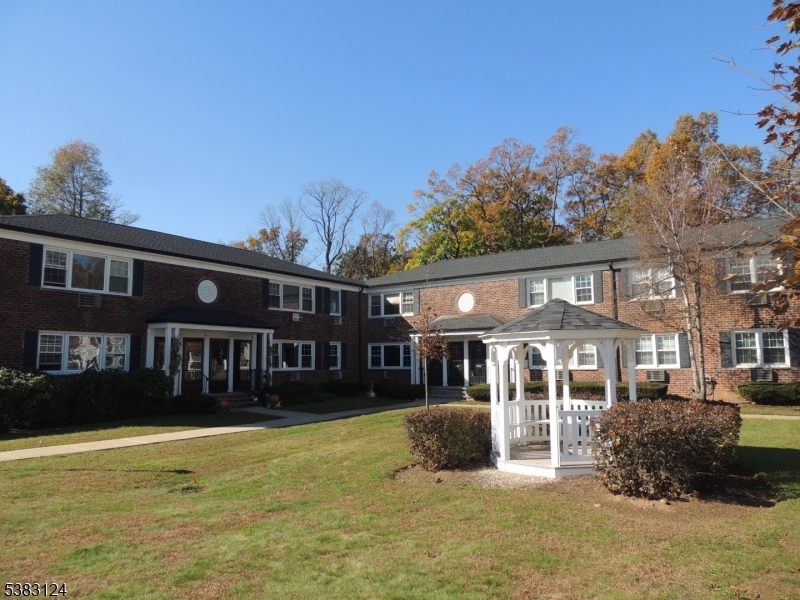 ONE-FLOOR LIVING in a prime Morristown location!!   This spacious first floor light, and bright, two-bedroom condo features large living room, eat in kitchen with white cabinets, primary bedroom with walk-in closet, second bedroom, and updated bathroom.  Enjoy the convenience of an in unit stackable washer and dryer along with generous closet space for your storage needs. Step out the back door to enjoy grassy area perfect for relaxing.  It comes with one assigned parking space; additional parking spots are available.   This well-maintained complex features a beautifully landscaped courtyard with gazebo, large association outdoor pool, sidewalks, convenient location in proximity to downtown Morristown, train station, hospital, and highways. Pets are welcomed!. Condo is currently rented for $2,625 and tenants would love to stay. Pictures are from old listing.   Come and see!!