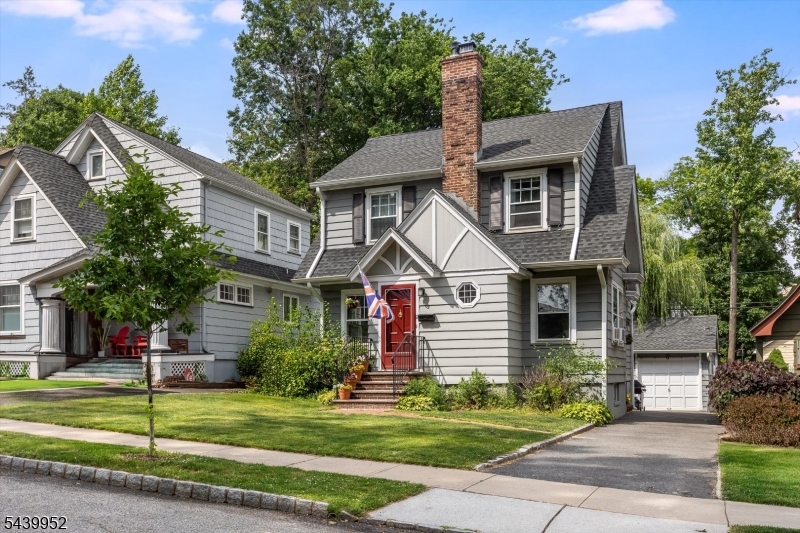 Classic Glen Ridge charm meets everyday functionality in this beautifully maintained home, where original architectural details have been thoughtfully preserved and cared for over the years. Warm and inviting, the main level offers a spacious living room anchored by a fireplace, with an adjoining office area that creates a versatile and comfortable gathering space. A large entry closet provides the convenient storage everyone wants and needs. The dining room leads to the light-filled sunroom, offering year-round enjoyment as a playroom, home office or play to relax. The eat-in kitchen features granite countertops, plentiful cabinetry, and ample room for casual meals and conversation. Upstairs are three well-proportioned bedrooms, each offering comfortable living space and abundant natural light. A walk-up attic with an attic fan provides excellent storage today and exciting potential for future expansion. Downstairs, the finished basement is equipped with French drains and a sump pump, offering added confidence and peace of mind. Outside, mature landscaping surrounds the property, creating a serene backyard setting with privacy and natural beauty. Perfectly positioned in one of Glen Ridge's most desirable neighborhoods, this home offers easy access to both the Glen Ridge and Bloomfield train stations for a convenient NYC commute. Residents enjoy access to Glen Ridge's highly regarded public schools, beautiful parks, and the shops and restaurants of nearby downtown districts.
