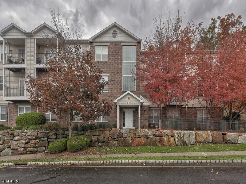 First floor corner unit, no stairs! This unit has been lovingly maintained and upgraded. Moldings throughout and a stunning custom living room built in complete with sliding barn doors for extra storage! Open floor plan with 9 ft ceilings, stainless appliances, and more, all within a quiet community boasting tons of amenities such as outdoor pool, fitness center, tennis, and clubhouse! Pets welcome (1 dog under 30 pounds). Schedule your tour today, you will NOT be disappointed!