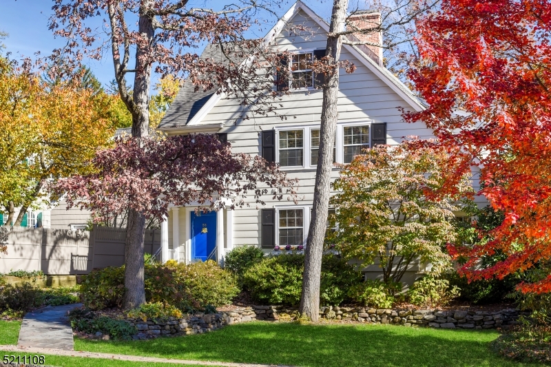 Stunning and spacious, this charming Glenwood colonial offers the perfect combination of style and function. Sophisticated architectural details, high ceilings, period millwork and abundant natural light are complemented by thoughtful enhancements throughout the home. The first level features a welcoming foyer, living room with wood-burning fireplace, a sun-filled den/office with French doors which open to the backyard, a formal dining room with coffered ceiling, an eat-in kitchen with a large center island and an adjacent family room with a gas fireplace, coffered ceiling and French doors leading to a bluestone patio. The second level includes four bedrooms, three full baths and a laundry room. The generously sized primary suite has two walk-in closets and a gorgeous marble tiled bathroom with dual sinks, shower stall and jetted tub. The third floor offers two additional bedrooms and another full bath. A spacious recreation room with 9-foot ceilings and additional storage rooms complete the lower level.  A private and level backyard with lush plantings and mature trees offers a multitude of options for outdoor entertaining and everyday enjoyment. Equally impressive is the home's location, just a few short blocks from the Short Hills train station with Midtown Direct service to NYC, close to the Hartshorn Arboretum and 1/2 mile from Glenwood Elementary School.