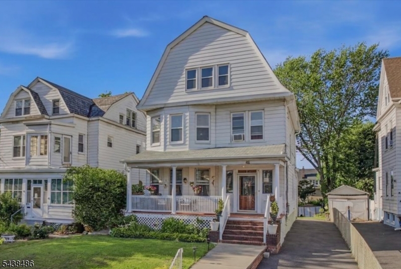 Step into a home where timeless character and everyday comfort come together beautifully. Set on an expansive 150-foot-deep lot along a wide, tree-lined street, this spacious 3,322 sqft residence offers 7 bedrooms and 4 full bathrooms spread across four levels. This impressive late Victorian home features thoughtfully preserved architectural details including oversized original wood windows, original pocket doors and millwork, hardwood floors, and elegant proportions. The formal dining room with its coffered ceiling creates a stunning setting for gatherings, while the expansive living areas offer warmth, charm, and plenty of room to entertain. Generously sized bedrooms provide comfortable retreats, and the home's substantial square footage ensures space for everyone. Outside, the inviting front porch welcomes you home and overlooks beautifully manicured landscaping. A stunning backyard complete with patio offers endless possibilities for entertaining, gardening, and relaxing. Enjoy the peace of mind of a long 4+ car driveway and ample street parking. A finished walkout basement with full bathroom and separate laundry area completes this package. Ideally located on a quiet residential block, this home provides convenient access to shopping, dining, transportation, and commuter routes offering the perfect blend of character, space, and location. Don?t miss the chance to call this impressive home yours!