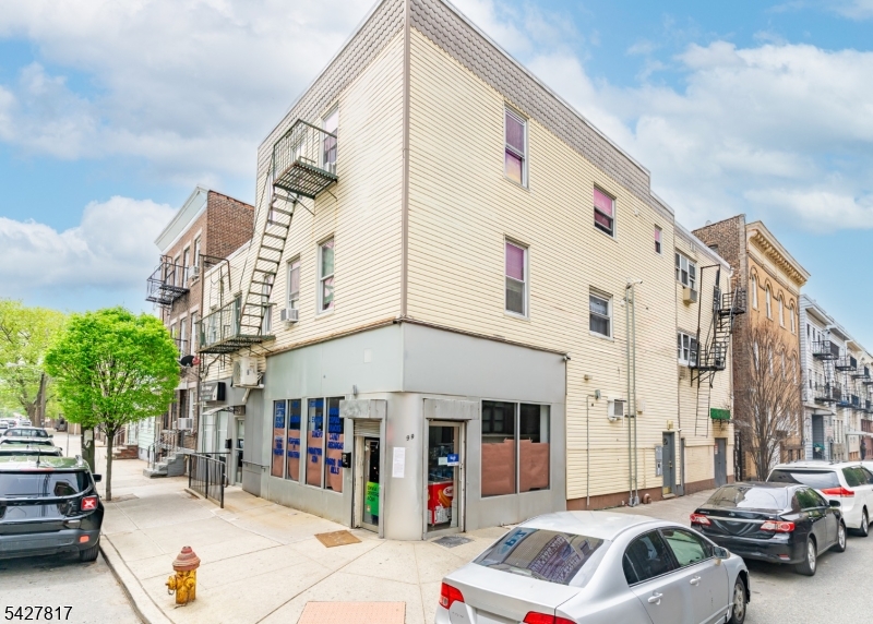 Mixed-use investment opportunity in a great location in the Ironbound. Property features 7 total units, including 2 commercial spaces and 5 residential apartments. Residential unit mix consists of two 3-bedroom units and three 2-bedroom units, offering strong rental demand and income stability.Commercial units provide additional income potential with excellent street frontage and visibility on the corner of Pulaski and E. Kinney St. Ideal for investors seeking diversified cash flow from both residential and commercial tenants.Conveniently located near major highways, public transportation, and local amenities.