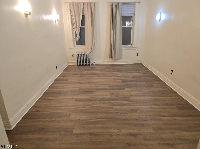 Experience the perfect blend of mid-century stability and modern convenience in this well-maintained Union City gem. This updated 1-bedroom, 1-bathroom residence features a traditional layout with distinct living and dining areas, offering a sense of space rarely found in modern studios. Located in a close to everything; you are just steps from Bergenline Avenue's vibrant dining and a 20-minute direct commute to Port Authority. The pet-friendly building offers essential amenities including on-site laundry and basement bike storage. With a low $350 monthly HOA fee covering water and sewer, this move-in-ready home is an incredible value for NYC commuters and first-time buyers alike. Solid, updated, and perfectly positioned.
