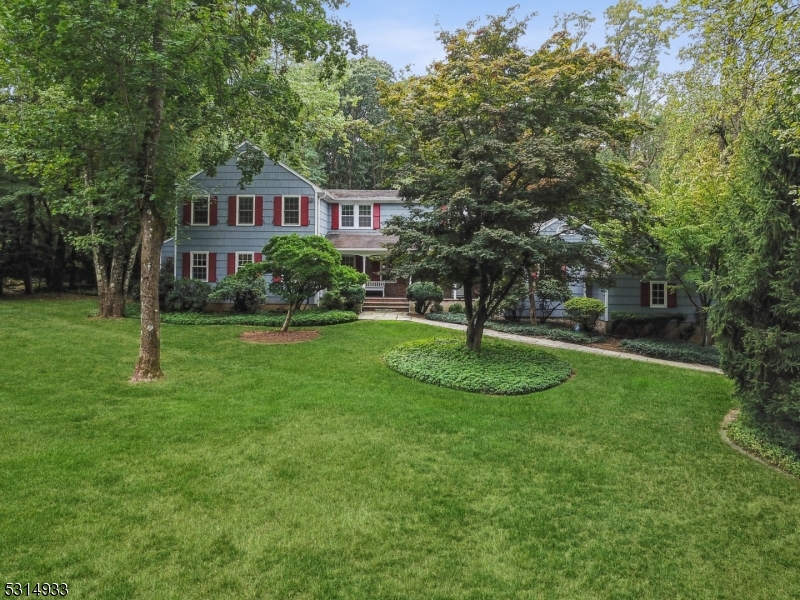 THIS IS IT! Magnificent setting nestled in a beautiful area of Gillette. This 5 bedroom, 3F2H bath colonial with updated kitchen and baths is located on nearly 1.2 acres of manicured landscape and has been cared for and lovingly maintained by the current owner. Upon entering the front door, the formal living room and formal dining room are perfect for entertaining. A large eat in kitchen with marble counter tops and Thermador stainless steel appliances, leads to the family room with gas fireplace. From there you can make your way to the sun room with gorgeous views of the oasis that is the rear yard. The first floor also includes a guest suite with full bath as well as a solarium with access to the deck. The second floor consists of three large bedrooms, hall bath and a spacious primary bedroom/bathroom, with vaulted ceilings and walk in closets. Large insulated windows and skylights throughout the home allow an abundance of natural light to flow in. There are hardwood floors throughout the home, a cedar closet in the basement, a full-time gas whole house generator and an over-sized 2 car garage has plenty of room for larger vehicles. Major mechanical systems have been updated and serviced on annual contracts. Half a mile from the Gillette train station and close to shopping, highways and recreation.