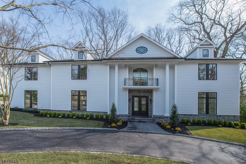 Welcome to this stunning 2019 full renovation in one of the most desirable Montclair neighborhoods. Exquisitely designed open concept home w/11' ceilings & floor to ceiling Pella windows and doors makes indoor/outdoor living a reality.  Custom designed chef's kitchen is destined to be the soul of this home. Each of 6 spacious en suite bdrms has radiant heat and custom closets; 2 rms w/balconies. Walk-out LL with entertainment area, sauna, extra bedroom, full bath + wine storage for 600 bottles. 3 car garage, custom mudroom and 2nd floor laundry complete the wish list. An 850 square ft stone patio w outdoor kitchen overlooks a park like back yard. This home features every amenity a discerning buyer seeks.