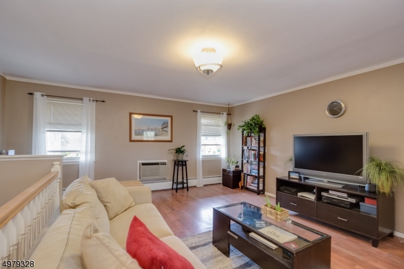 Extremely well maintained condo with wood floors, quartz countertops, walk in closet, in-unit laundry, attic storage, and energy efficient windows which result in lower maintenance fee for complex. Located 1 block from downtown Bloomfield Ave, the public library, and bus stops with NYC access, this is a perfect location for those who want to be near public transportation.  With plenty of well regarded local restaurants, combined with all kinds of activities available locally don't miss out on this great opportunity to own in the hidden gem that is Caldwell.  Heat and hot water included in maintenance fees.