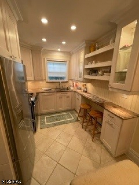 Location, location, location! This beautiful COOP is a rare and affordable find in Morristown. One exceptionally large Bedroom and updated Full Bath. Dining Room/Living Room Combo. Monthly fee includes PROPERTY TAX, heat, hot water, sewer, outdoor maintenance, snow removal & pool membership. This unit has a recently purchased Washer/Dryer. Part of your monthly fee may even be TAX DEDUCTIBLE, check with your tax professional! This property is close to Morristown Medical Center, Morristown Train Station, Kings Supermarket, and downtown Morristown yet the grounds are very private. Best of City and Country Life! Living Room/Dining Co-Op Approval Required. All room sizes are approximate.