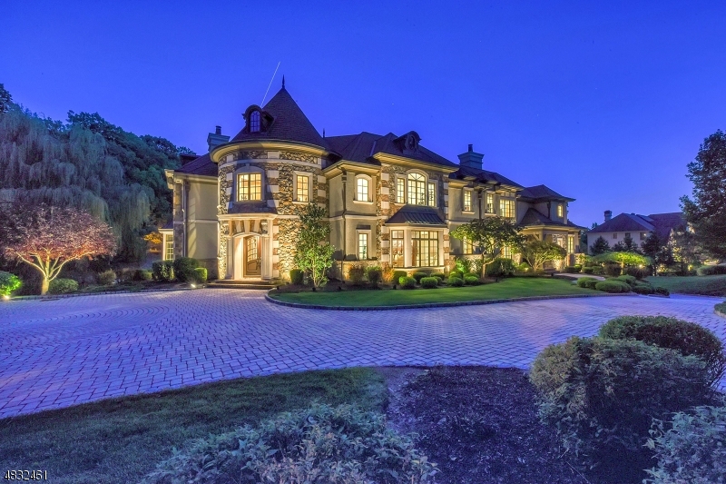 Welcome to this over 10,000 sq. ft custom 5 bedroom, 6 full and 2 half bath home built in the sought after "Valhalla Estates" in Montville, NJ. First floor features a dramatic 2-story entry foyer, formal living and dining rooms, great room with high ceilings and fireplace, gourmet kitchen with stainless steel appliances and granite center island, office, powder room and sitting room. Master suite on the second floor is complete with large walk-in closet, sitting area and luxurious master bath with jacuzzi and steam shower. The amazing walk-out basement is perfect for entertaining with a sound proof movie theater, game room, bar and exercise room. This home is truly a must see!
