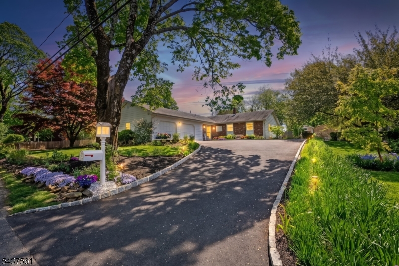 Experience the charm, convenience & lifestyle of highly sought-after Mendham Borough with this unique, versatile & surprisingly spacious ranch-style home in the heart of town. Offering true first-floor living plus a fully renovated lower level with its own private access, this property presents exceptional flexibility for two separate levels of living, guest accommodations, a home office setup, or potential investment/income-producing opportunities. Featuring 4 bedrooms & 3 renovated full baths, the home is ideally located just moments from top-rated schools, including National Blue Ribbon Hilltop Elementary School & Mendham HS with its highly ranked International Baccalaureate (IB) Program. The sun-filled main level includes an updated eat-in kitchen w/ granite island & wet bar, a spacious, comfortable living area, a primary en suite, two additional bedrooms & an attractive hall bath. The fully refurbished ground floor is especially impressive with large, versatile living spaces, a bedroom, full bath, laundry & dinette, making independent living on this level possible. Outside, the screened porch, deck, patio, fully-fenced backyard & lush seasonal landscaping are sure to please! Boasting public sewer & water, enjoy the best of Mendham living along with close & convenient access to major roads, nationally ranked Morristown Medical Center, Morristown train w/ Midtown Direct access to NYC & Newark Airport. Expansion Plans Available - Customize Your Home in the Heart Of Mendham!