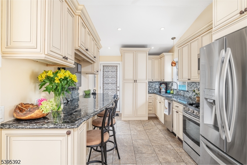 The perfect blend of charm, comfort, and modern upgrades--move right in and enjoy!  Welcome home to this storybook 2-bedroom charmer on a sunny corner lot just steps from Wawayanda State Park. From the inviting front porch to the peaceful stone patio with a seasonal view of Lake Wanda, every space is made for relaxing and enjoying the outdoors. Inside, you'll love the stunning kitchen with custom cabinetry, Cambria quartz counters, and stainless-steel appliances. With over $100K in upgrades in the last seven years including a new bathroom and septic (2020), high-efficiency furnace and water heater (2018), central air and mini split, roof and siding (2021), driveway, paver walkway, and shed (2022), plus a whole-house generator (2024). Everything's been done for you. Just move in, unpack, and start living the good life surrounded by nature.