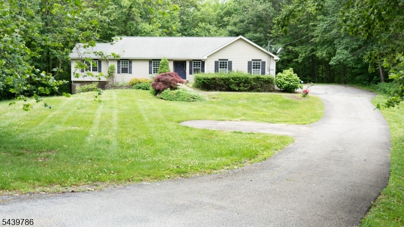 Welcome home to this beautifully maintained, one-owner ranch offering 3 bedrooms and 2.5 baths on a quiet dead-end road. Thoughtfully designed with ADA-compliant accessibility in mind, this home combines comfort, convenience, and quality throughout.The heart of the home is the brand-new kitchen, featuring modern finishes and ample space for cooking and entertaining. The spacious living room opens to a rear deck overlooking the fenced backyard, providing the perfect setting for outdoor dining, and relaxing.The finished walkout basement offers additional living space, ideal for a recreation room, home office, gym, or guest area, with direct access to the backyard. An automatic whole-house generator provides peace of mind year-round.Outside, you'll find a long driveway with plenty of parking, a large front lawn, and a private fenced backyard. Lovingly cared for by its original owner, this move-in-ready home offers the perfect blend of accessibility, functionality, and peaceful living.Don't miss this rare opportunity to own a meticulously maintained ranch in a desirable, quiet location.