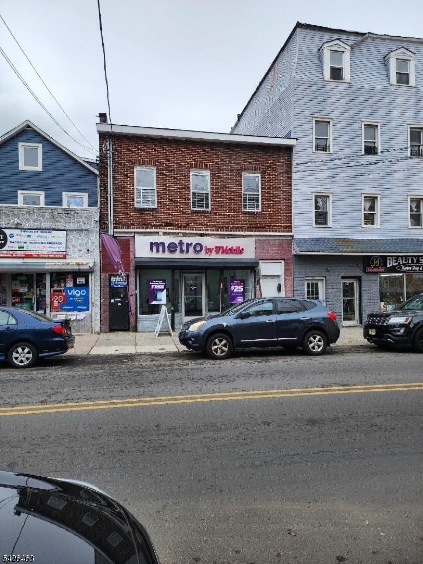 Turn key mixed-use investment opportunity at 62 3rd Street in Elizabeth. This fully renovated building offers an excellent location with strong income potential. The property features three units, including one street-level commercial space currently leased to a mobile business and two residential apartments, with one that is tenant-occupied and the other is tenant-ready. Ideal for investors seeking immediate cash flow, this well-maintained property combines stability with upside. The commercial unit provides established tenancy, while the residential units offer flexibility for rental income or owner occupancy. Conveniently located near major transportation, shopping, and local amenities, this is an exceptional opportunity to own a high-performing asset in a growing area. Don't miss your chance to secure a solid investment schedule a viewing today.
