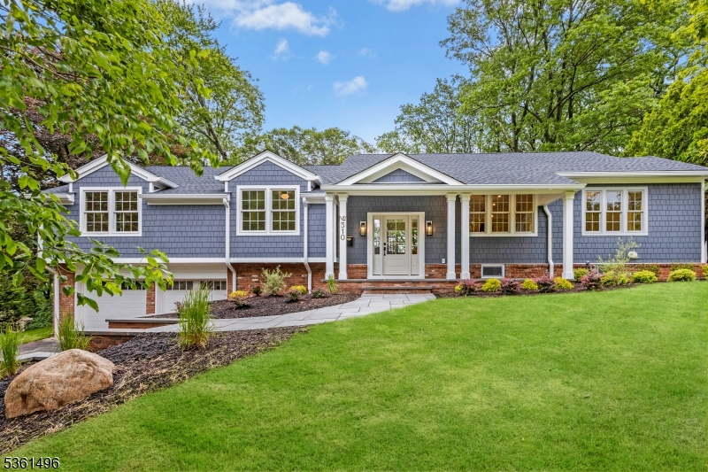 Welcome to this impeccably renovated raised ranch offering modern luxury and timeless design in one of Westfield's most sought-after neighborhoods. nestled in the serene indian Forest section, this home showcases quality craftsmanship and top-tier finishes throughout.The main level BOAsts an inviting living room with a gas fireplace flanked by custom built-ins, a formal dining room perfect for entertaining, and a walk-in pantry. The heart of the home is the chef's dream kitchen, featuring a natural wood center island, sleek quartz countertops, custom tilework, a built-in coffee bar, and premium Thermador appliances an entertainer's delight!Three spacious bedrooms grace the main level, including a luxurious primary suite with a spa-inspired full bath, designer tile and a large walk-in closet.Conveniently located laundry room complete the main level.The ground level offers exceptional versatility with a sprawling family room, a private office, an additional bedroom, and a full bath ideal for guests, or extended living needs. Plus mudroom and a two-car garage.Step outside to enjoy the beautifully landscaped yard with scenic mountain views, a composite deck for outdoor dining, and a paver patio perfect for relaxing or entertaining.Everything is brand new inside and out featuring high-efficiency two-zone HVAC, Andersen windows, and more. This is truly a turnkey home that blends upscale living with comfort and function.Plus just blocks to schools, train and downtown!