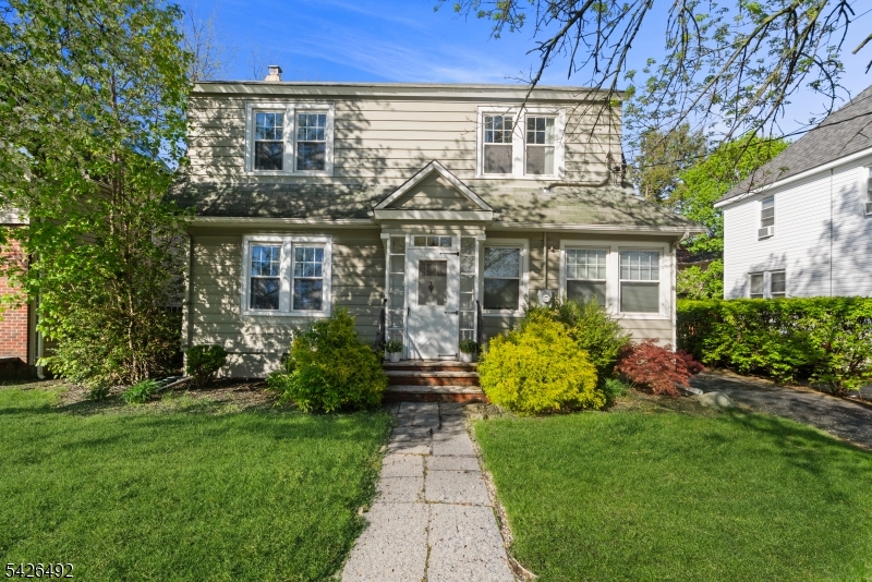 Beautifully maintained Colonial home offering 4 bedrooms and 2 full bathrooms, ideally located in a highly desirable area close to downtown Maywood, top-rated schools, major highways, and convenient NYC transportation.  A sun-drenched foyer welcomes you into an expansive living room highlighted by walls of windows, along with a formal dining room with rich hardwood flooring, and a modern eat-in kitchen. The first floor also includes a versatile bedroom or private office, along with a full bath for added convenience and flexibility.  Upstairs, you'll find three generously sized bedrooms (4th bedroom currently being used as a walk-in closet), and a full bath complete with a timeless clawfoot soaking tub. A charming sunroom provides the perfect spot for morning coffee or enjoying quiet moments. The fully finished basement offers additional living space with a dedicated laundry area and abundant amount of storage.  Step outside to enjoy a backyard ideal for entertaining and summer gatherings, complemented by an oversized two-car detached garage complete with its own electric subpanel.  A rare opportunity to own a home that perfectly blends classic character, modern comfort, and an exceptional location. This is where your next chapter begins " Welcome Home"