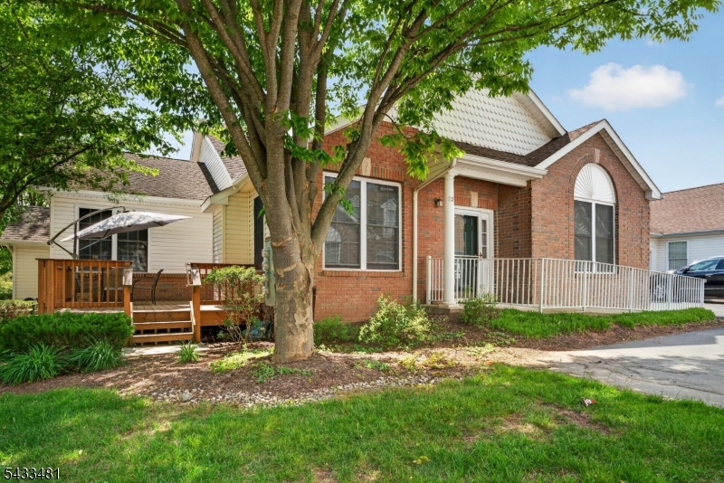 Welcome to the sought-after Flemington Fields 55+ Community! This hard-to-find Buttercup 1 model offers a versatile and spacious floor plan featuring 3 bedrooms, 3 full baths, a loft, and a full basement for abundant storage. Hardwood floors extend throughout the first level, including the desirable first-floor primary suite complete with a walk-in closet and private full bath.The sunlit kitchen is beautifully appointed with upgraded cabinetry and granite countertops, opening seamlessly to the dining room and inviting living room with a gas fireplace?perfect for both everyday living and entertaining. Step outside to the large private deck, ideal for relaxing or enjoying outdoor dining.A second first-floor bedroom with an adjacent full bath provides flexibility for guests or a home office. Upstairs, you?ll find an additional bedroom area, full bath, and loft space?perfect for visitors, hobbies, or a private retreat. Additional highlights include a 1-car garage and low-maintenance living in one of the area?s most desirable active adult communities.