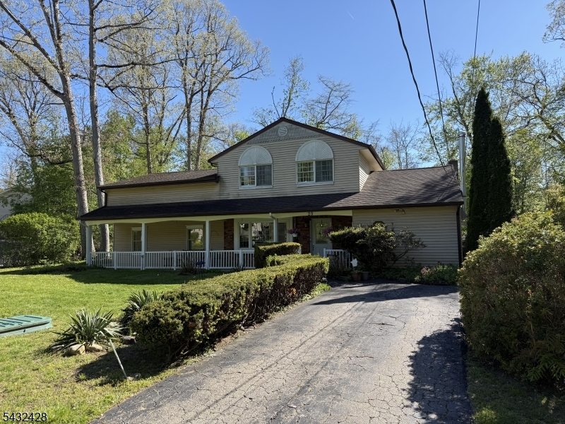 Beautiful Custom Colonial perched on park like property. 3 Bedroom (3rd bed combined into one) Huge Primary bedroom with large closets.large property level lot, updated septic.